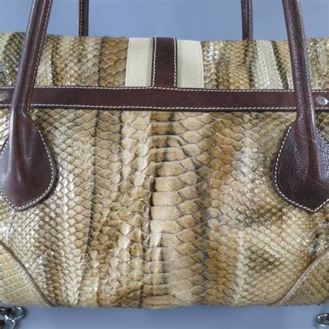 snake buckle bag
